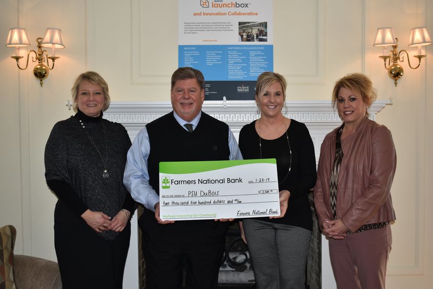 Left to right, Jean Wolf and Chancellor M. Scott McBride, Danyell Bundy and Kelli Allison.