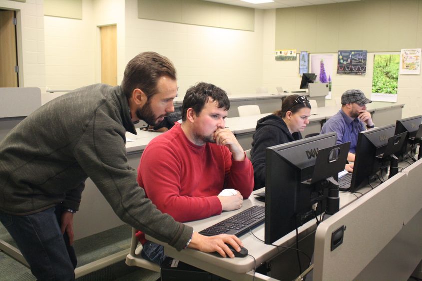 Instructor in Earth Sciences Patrick Applegate guides student James Greenawalt