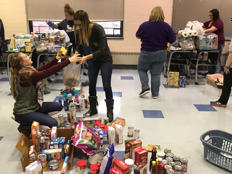 Students assemble care packages for area shelters. 