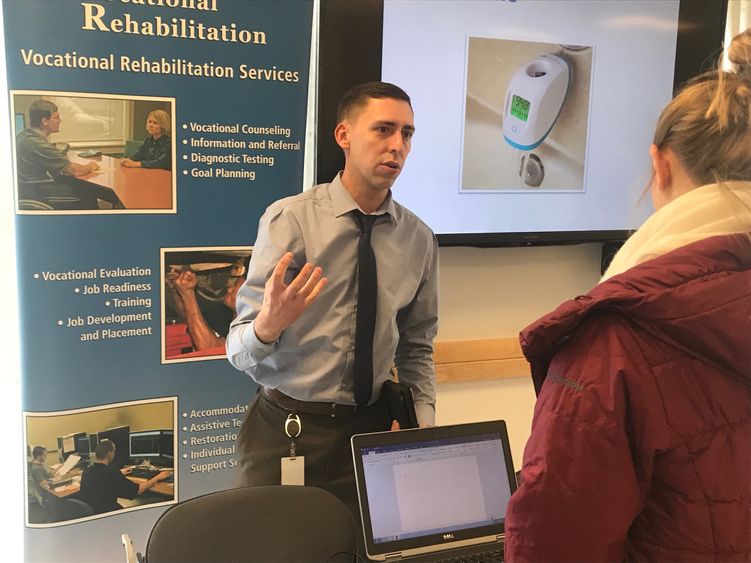 Mike Jacobson demonstrates new technology that can help people to complete tasks at work, or at home.