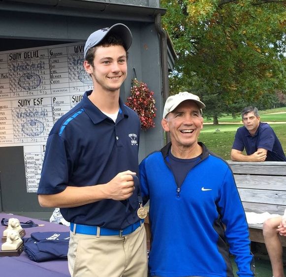 Penn State DuBois Golfer Tyler Woodard with PSUAC Commissioner John Fritz.