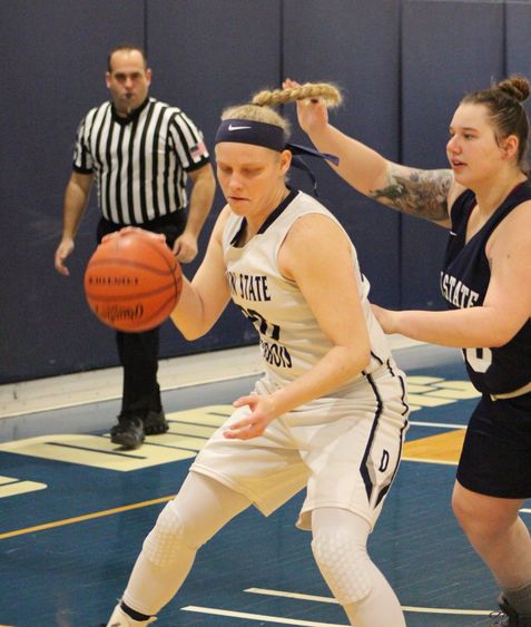 Melody Yong charging toward her 1,000th career point.