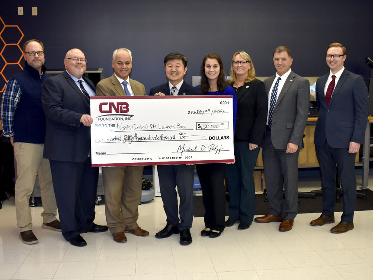 Leadership from CNB Bank present a check in support of the North Central PA LaunchBox