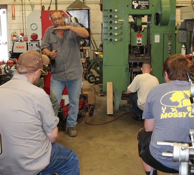 Students receive hands-on instruction on the shop floor.  