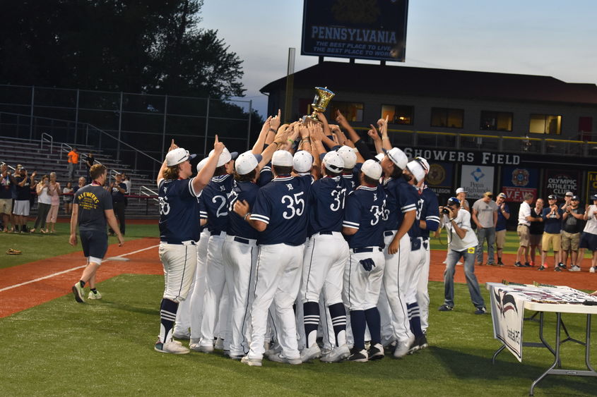 The Penn State DuBois Baseball Team hoists their championship trophy, celebrating the third USCAA World Series Victory for the team. 