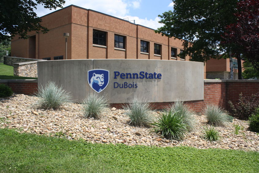 Sign at the front of Pennn State DuBois - Smeal Building in the background. 