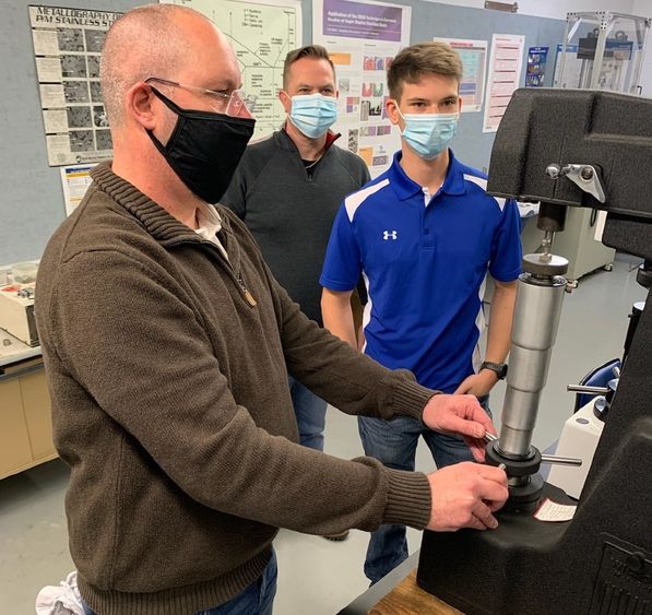 Testing powder metal samples in the Penn State DuBois engineering labs. 