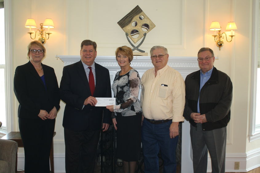 Left to right, Penn State DuBois Director of Development Jean Wolf and Chancellor M. Scott McBride accepting a gift from Trustees for the A.J. and Sigismunda Palumbo Charitable Trust, Joe Palumbo, Karin Pfingstler, and Bob Ordiway.