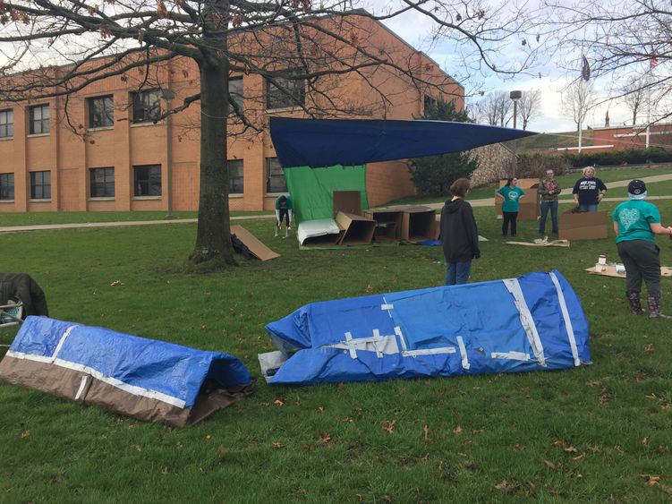 Students constructed makeshift shelters from carboard boxes and tarps during the Sleepout for Homelessness. 