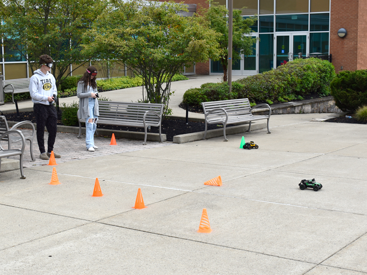 Students wear intoxication goggles and attempt to navigate an RC course to experience the effects of alcohol and other drugs.