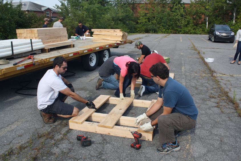 Students work to build basking platforms 