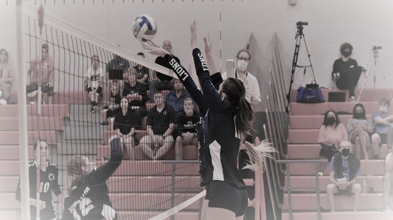 DuBois at the net in a weekend volleyball match.